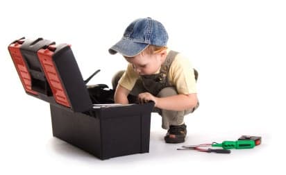 Child with toolkit