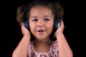toddler with earphones