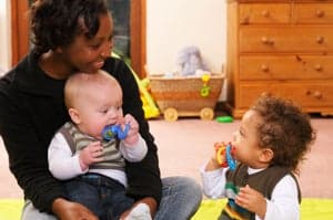 care provider with two toddlers