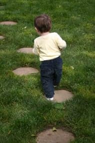 boy walking in garden