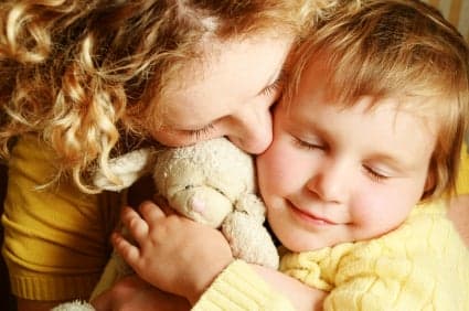 mother comforting child