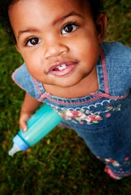 baby with milk bottle