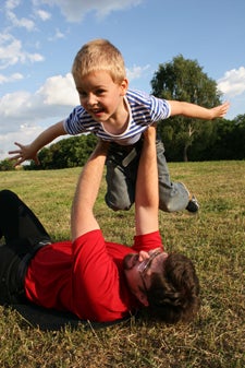 father and son playing