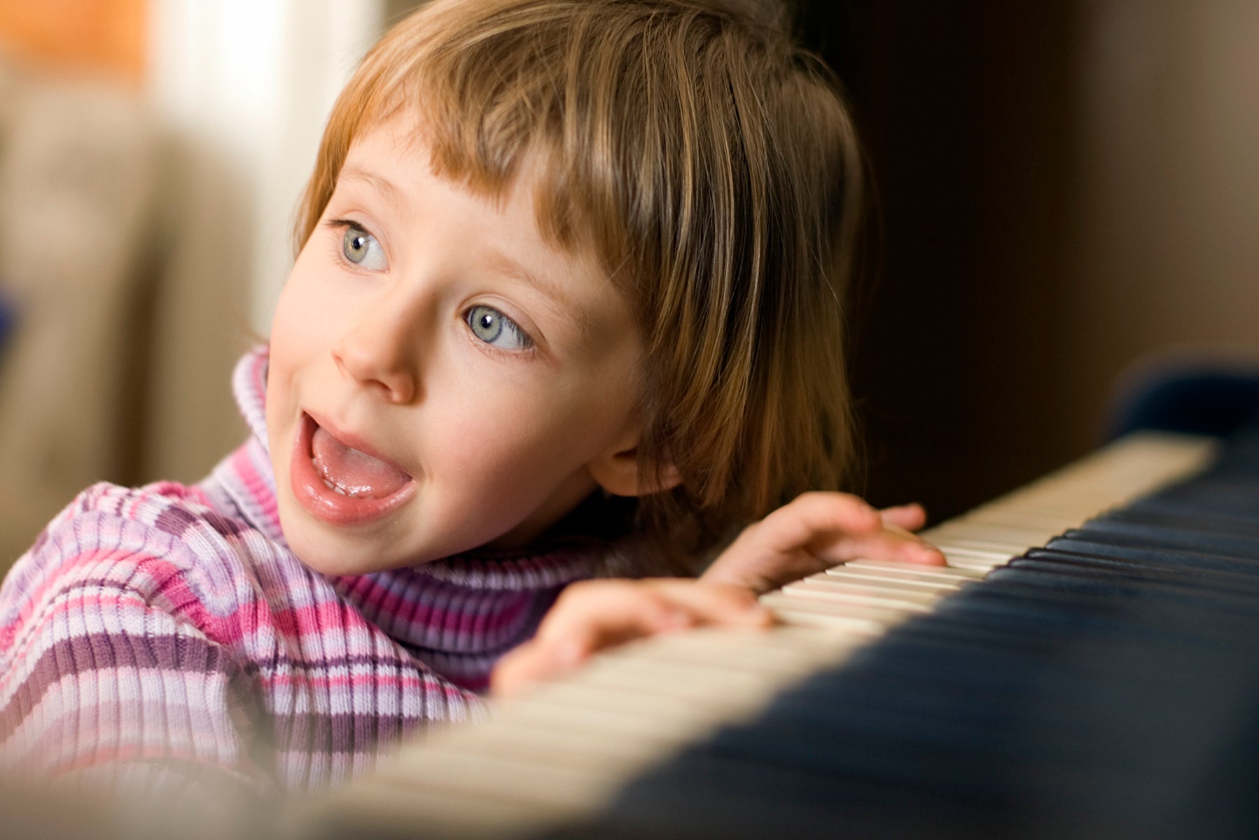 girl at piano