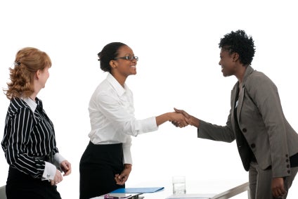 women shaking hands