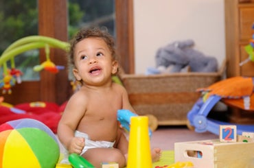 infant in playroom