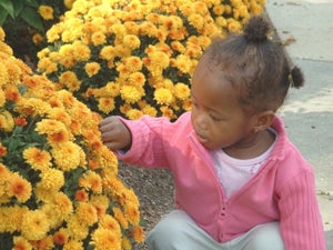 Little girl with flowers