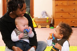 care provider with two toddlers
