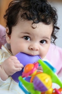infant with toy