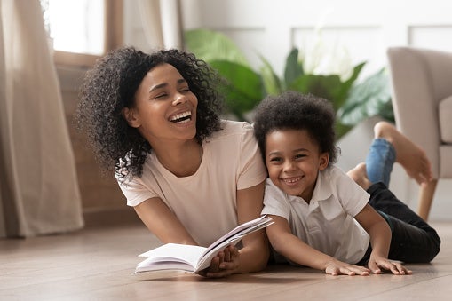 Caring mother with child at home