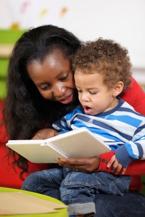 child reading with mother